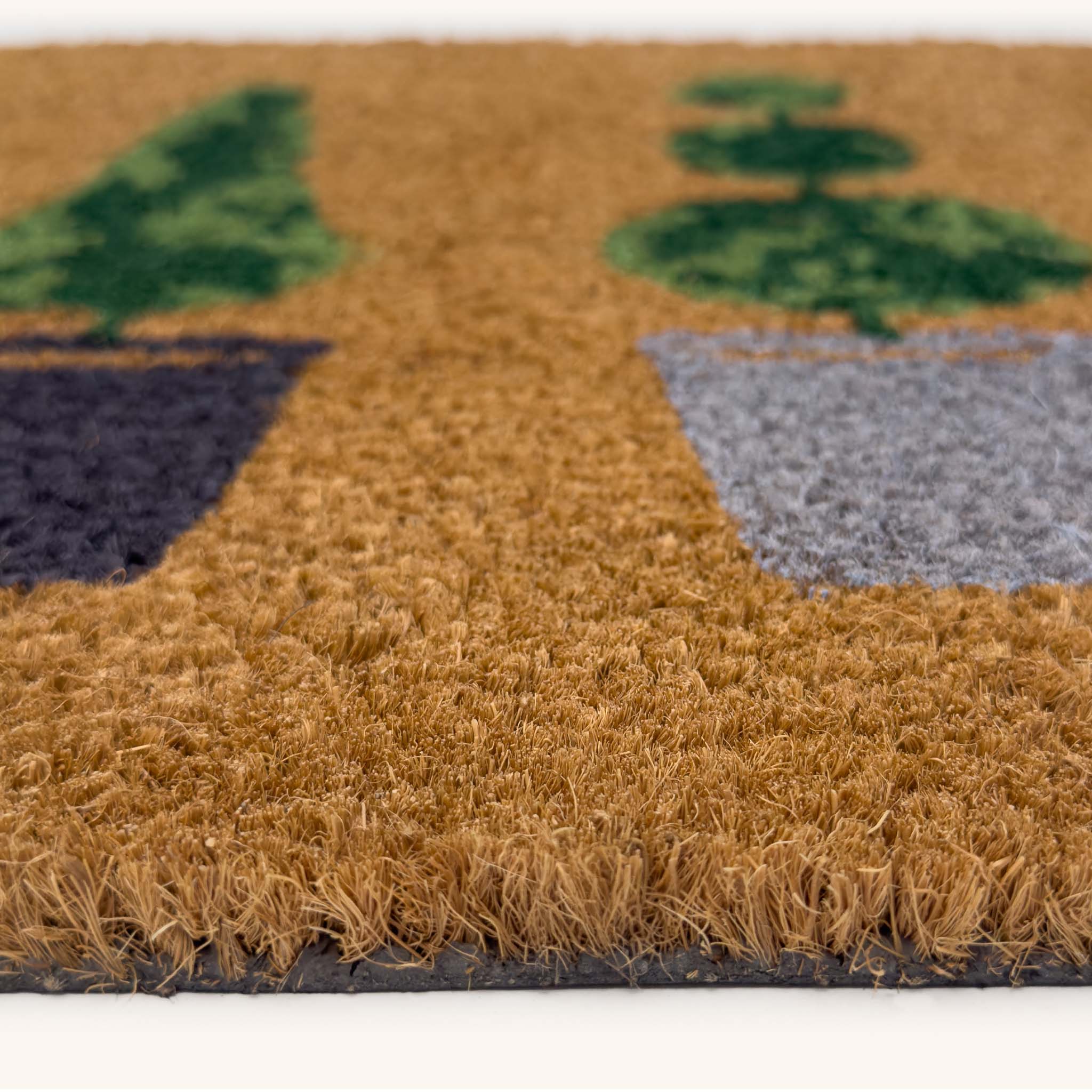 Topiary Coir Doormat - a 100% recycled material coir doormat featuring 5 potted plants.