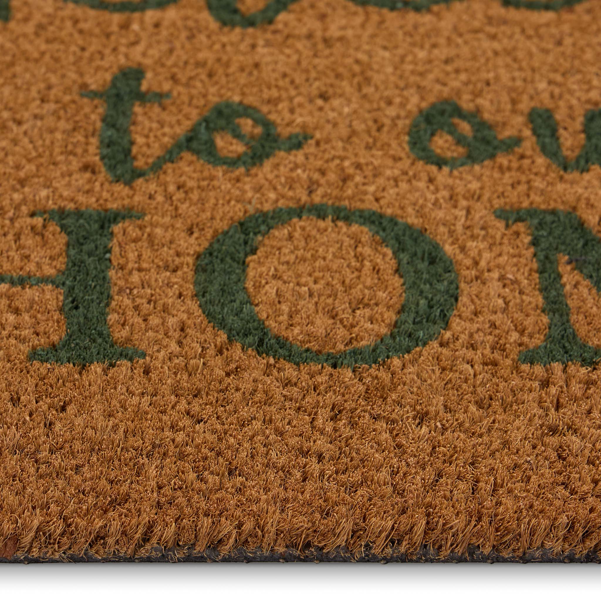 Welcome Paws Coir Doormat- made from natural coconut husks fibres featuring a paw print border with 'welcome to our home' written in the middle.