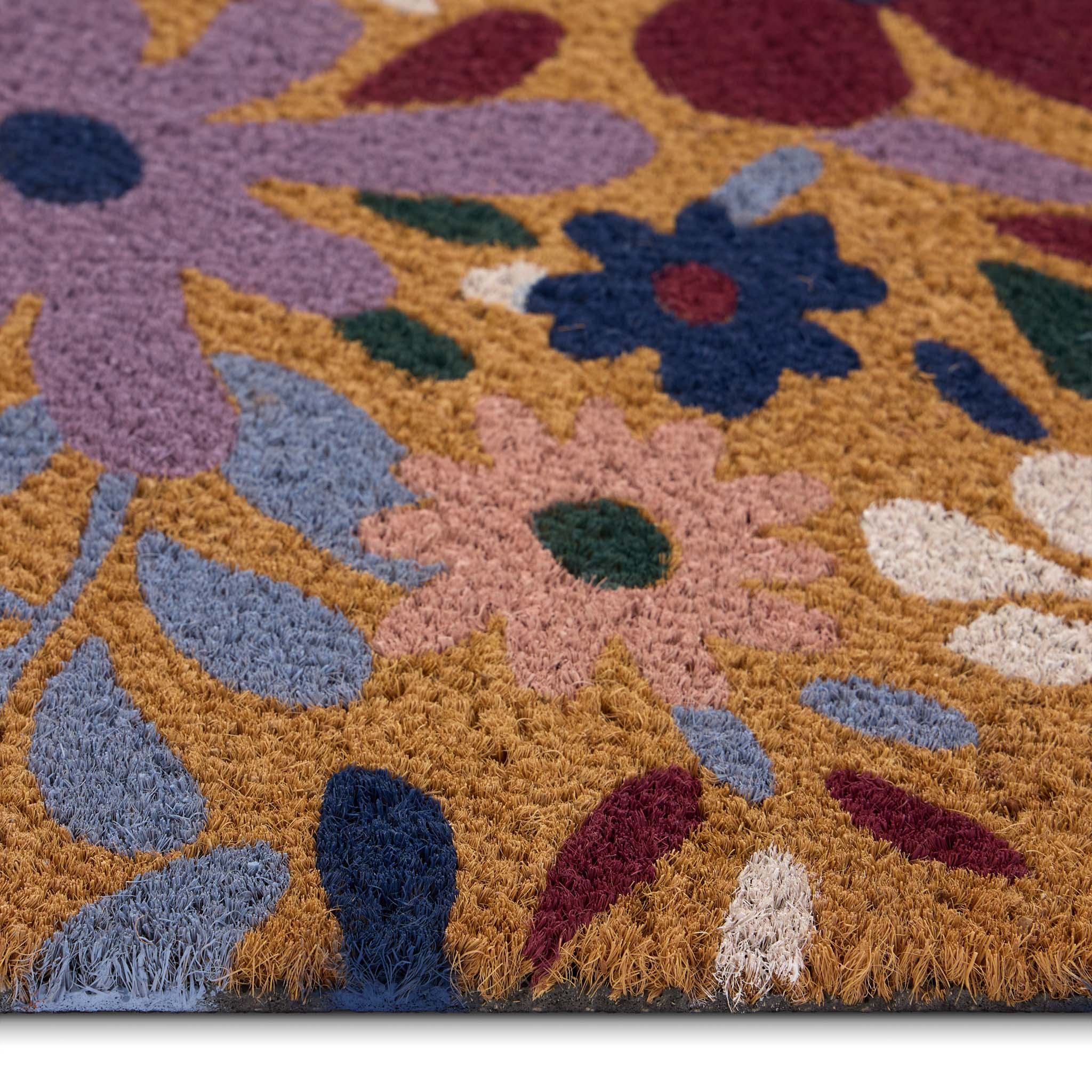 Wildflower Meadow Coir Doormat- made from 100% natural coconut husk fibres featuring oversized blooms.