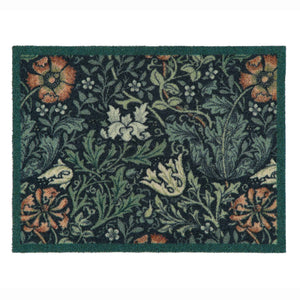 A rectangular outdoor doormat with a dark green border and a dense floral and botanical pattern in muted green, beige, orange, and white on a dark background.