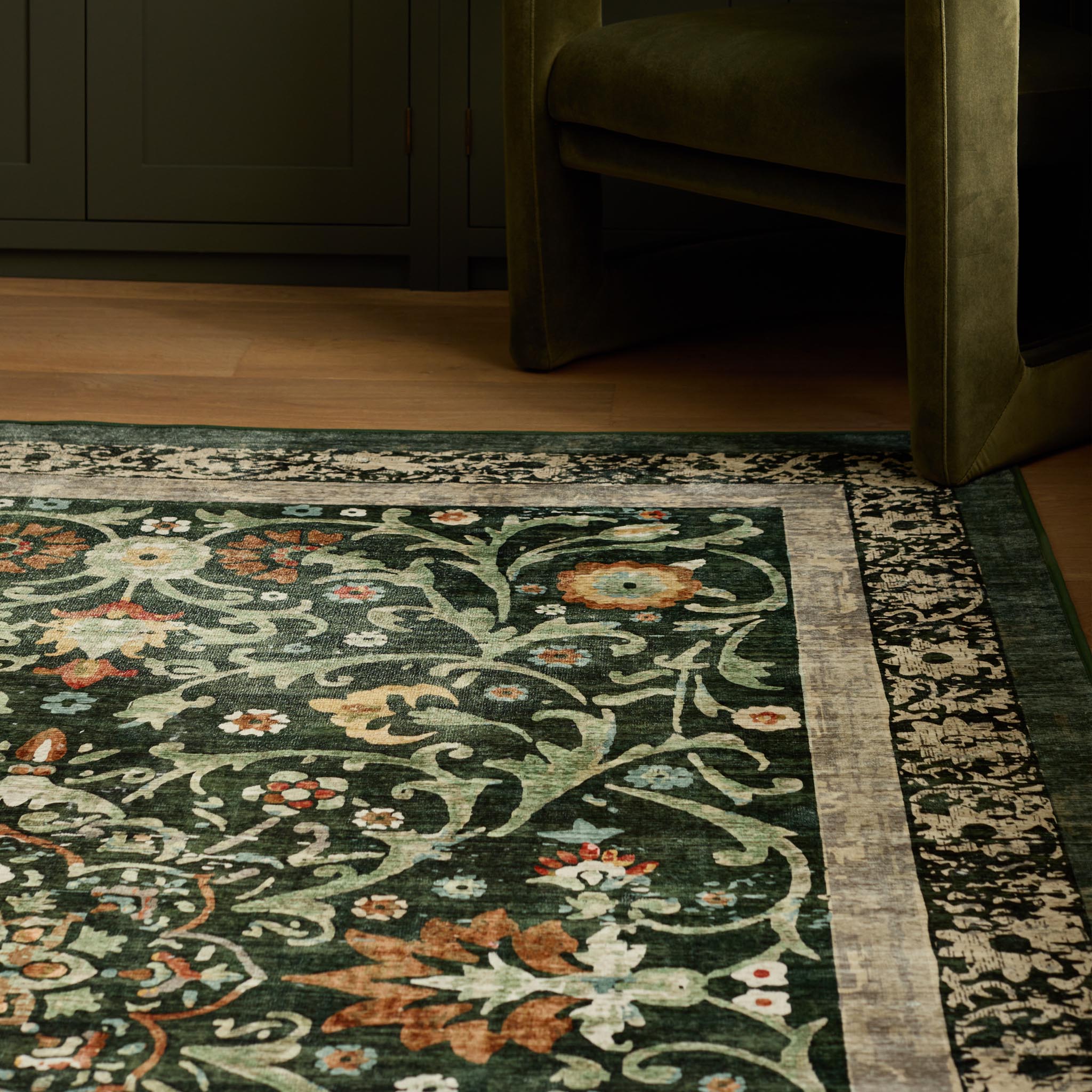 Country Paisley Green Eco-Washable Rug- a green eco -washable rug featuring various florals. 