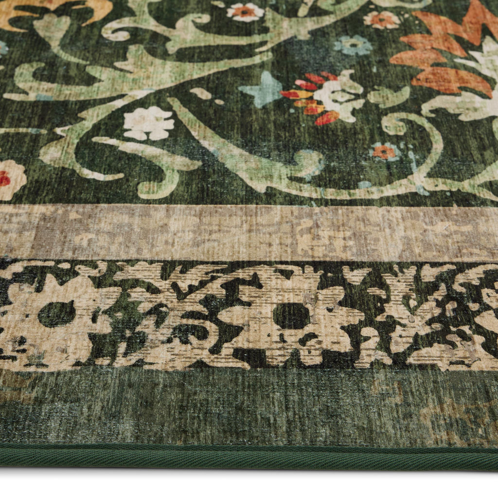 Country Paisley Green Eco-Washable Rug- a green eco -washable rug featuring various florals. 
