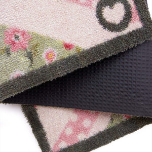 Country Rose Flag Doormat- 100% recycled cotton doormat featuring a pink union jack flag surrounded by florals.