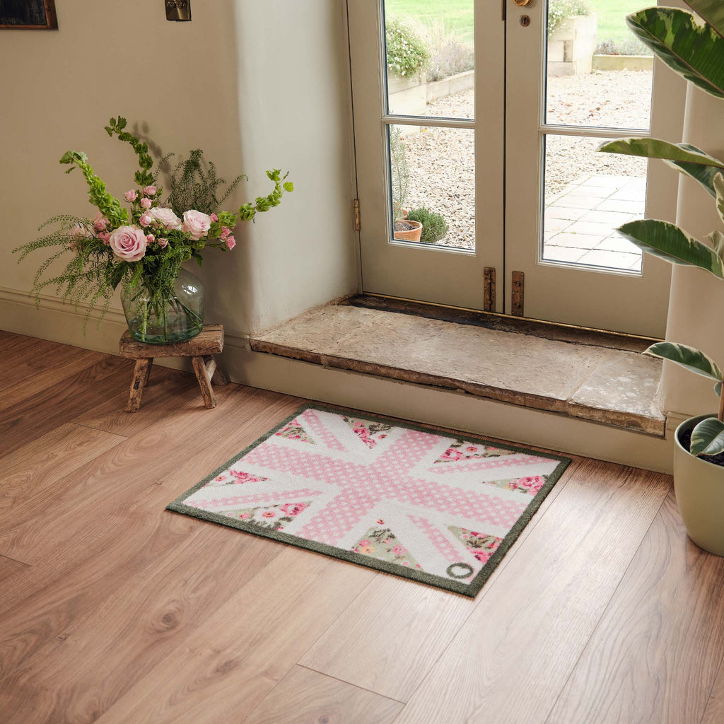 Country Rose Flag Doormat- 100% recycled cotton doormat featuring a pink union jack flag surrounded by florals.