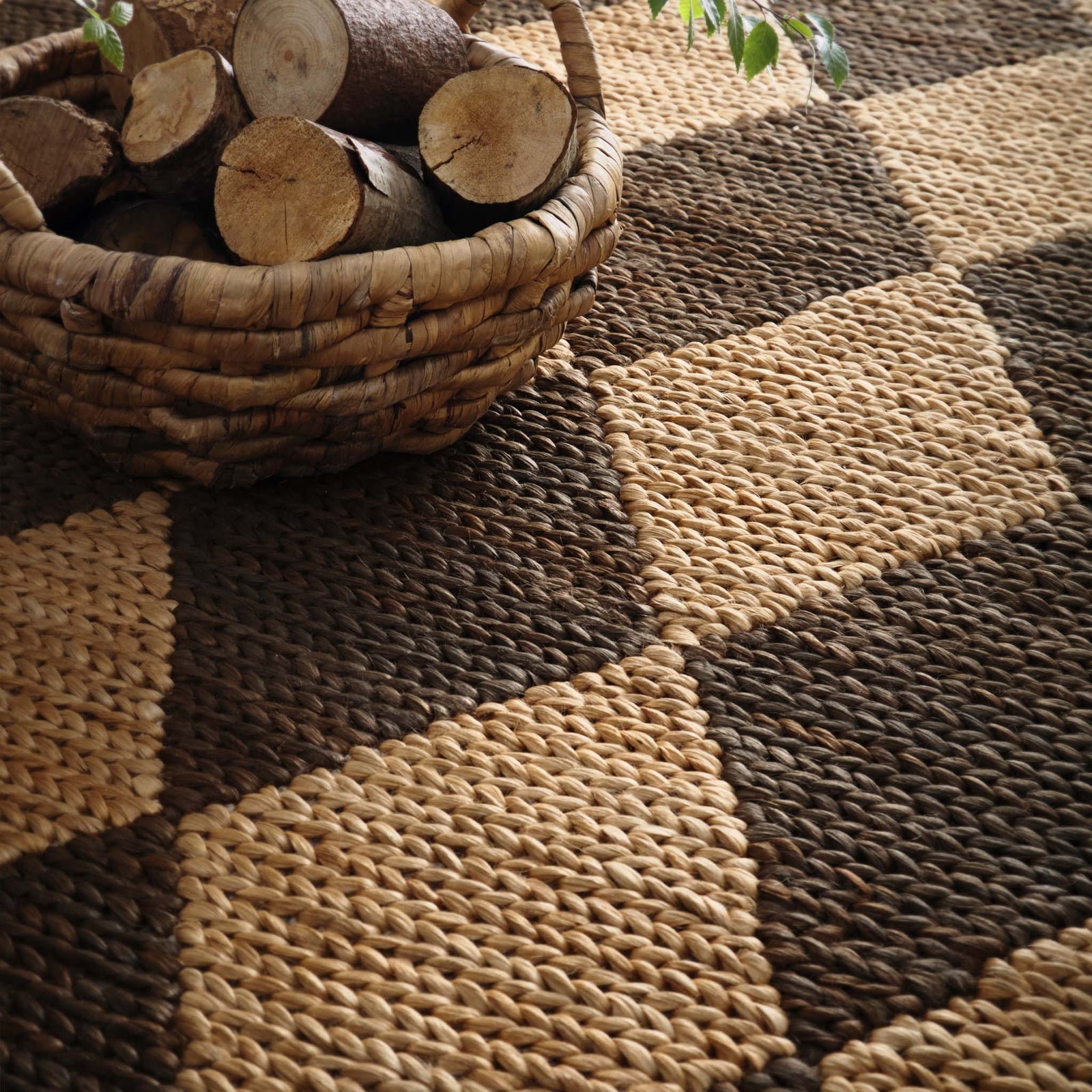 Close-up of Diamond Jute Natural/Brown Rug with a natural and brown diamond pattern.