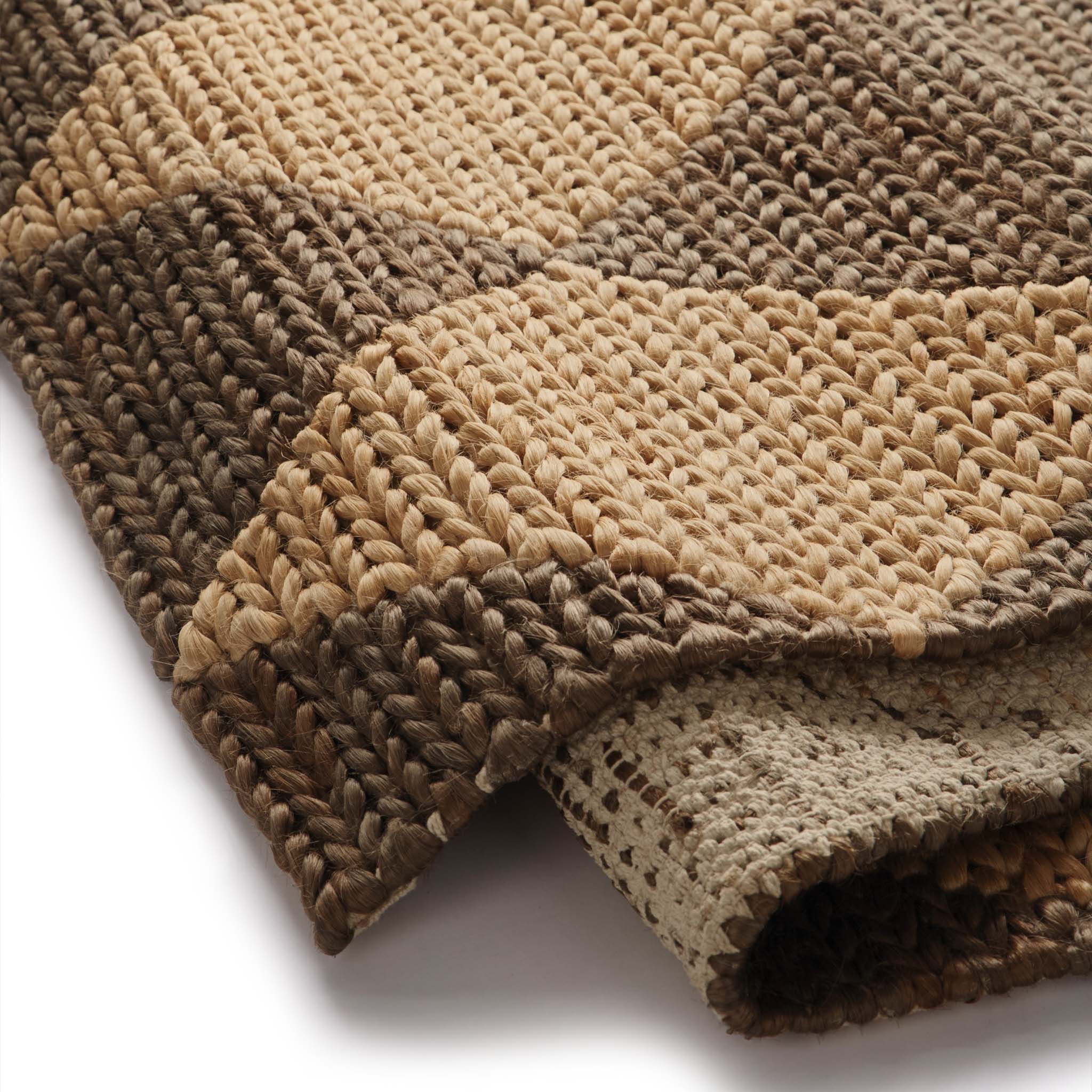 Close-up of Diamond Jute Natural/Brown Rug with a natural and brown diamond pattern.