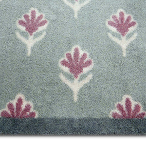 Disty Floral Green Doormat- 100% recycled cotton doormat featuring a woodblock pattern of purple flowers.