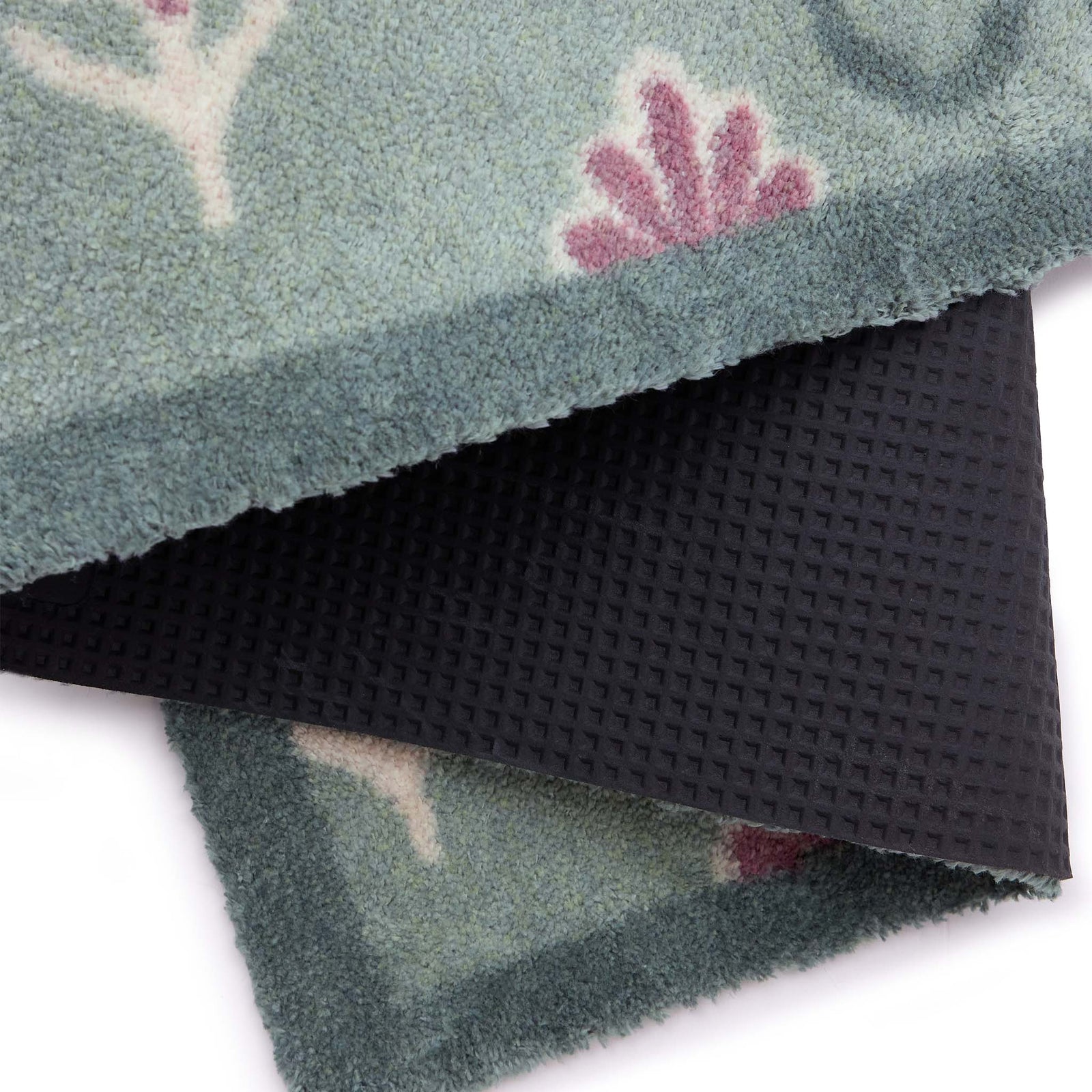 Ditsy Floral Green Runner- 100% recycled runner featuring a woodblock pattern of purple flowers.