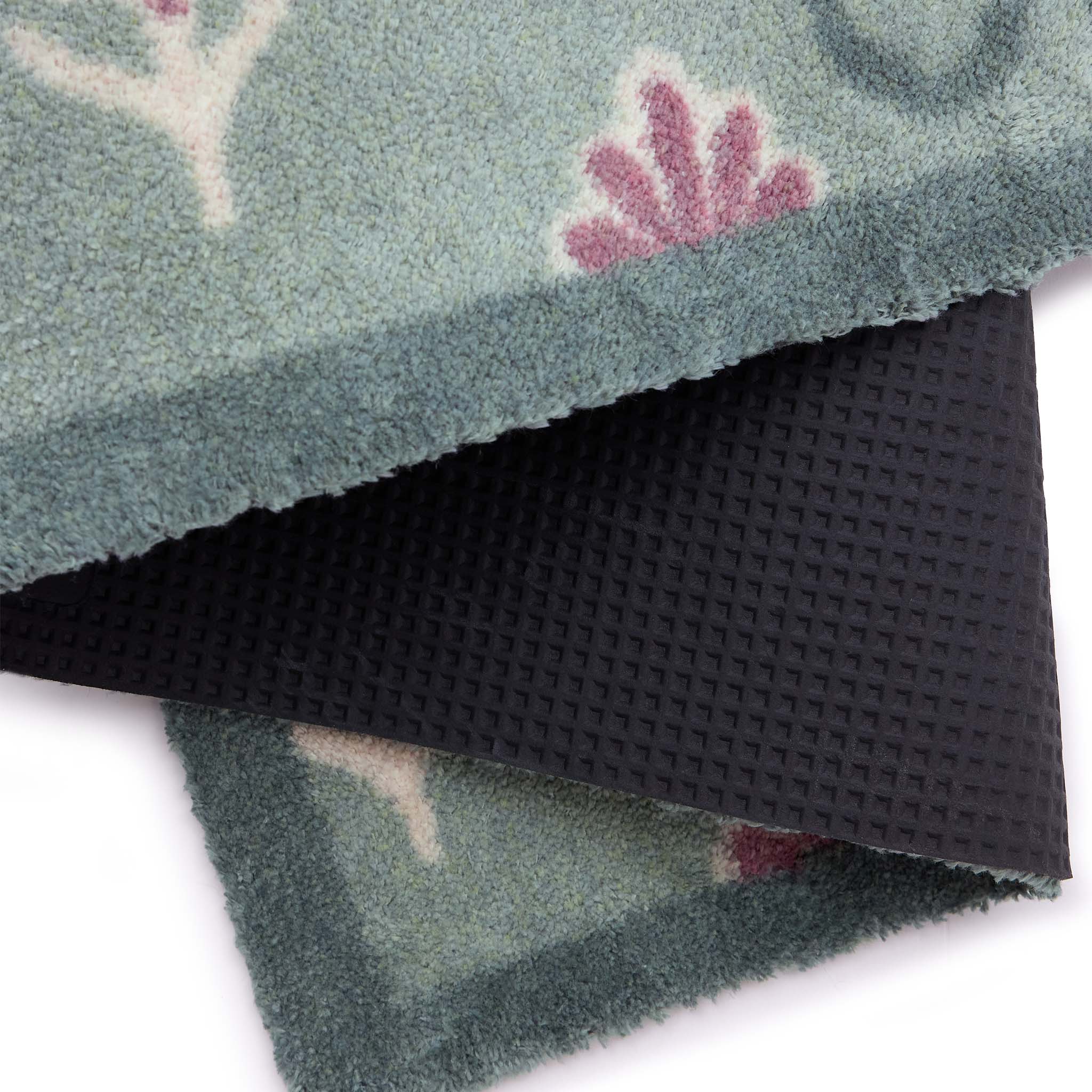 Ditsy Floral Green Runner- 100% recycled runner featuring a woodblock pattern of purple flowers.
