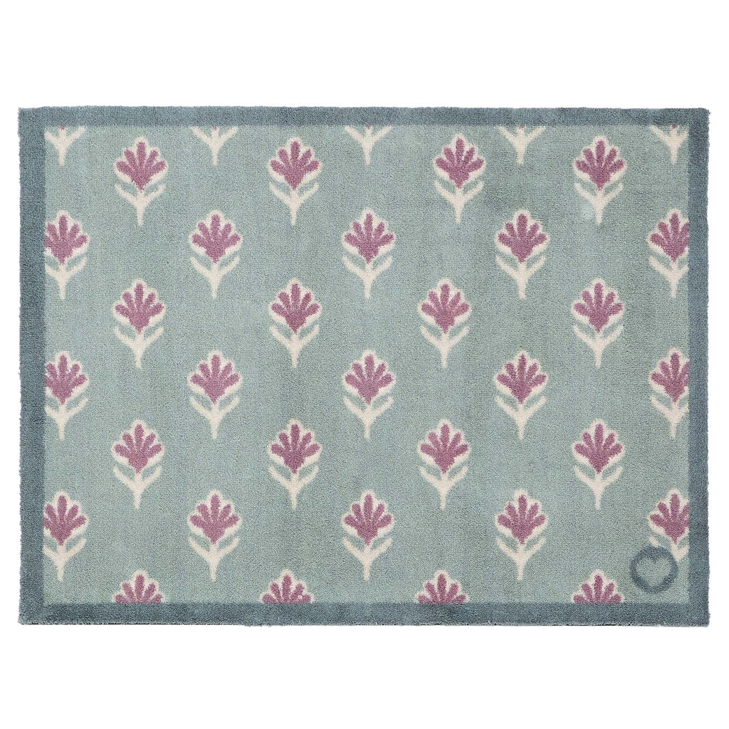 Disty Floral Green Doormat- 100% recycled cotton doormat featuring a woodblock pattern of purple flowers.