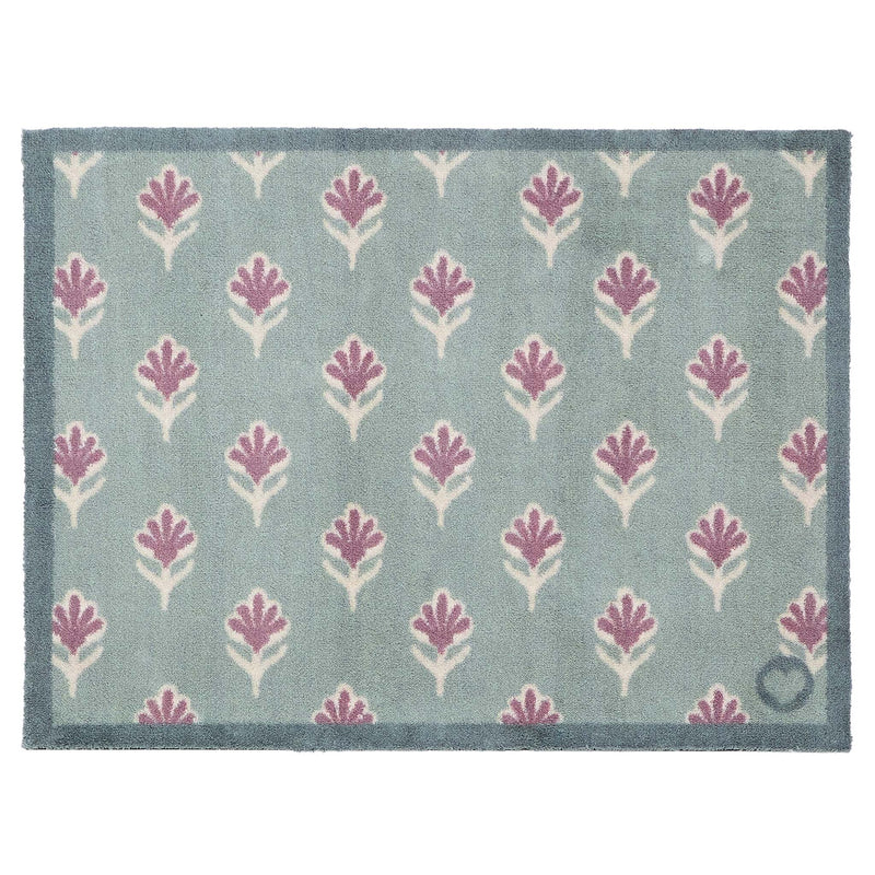 Ditsy Floral Green Doormat- 100% recycled cotton doormat featuring a woodblock pattern of purple flowers.