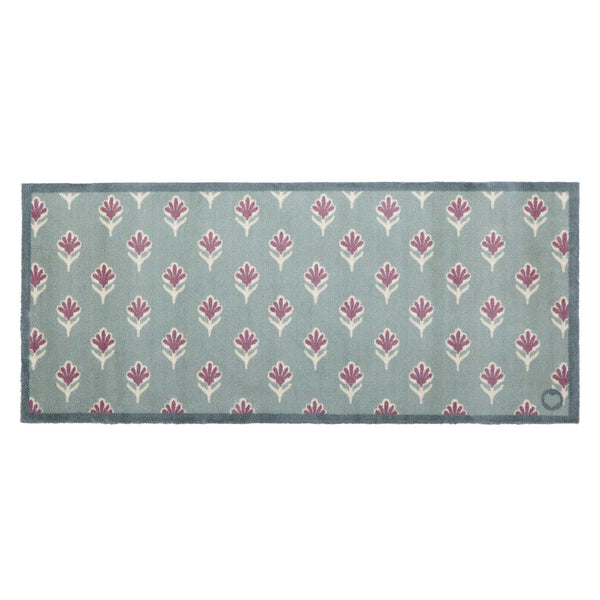 Ditsy Floral Green Runner- 100% recycled runner featuring a woodblock pattern of purple flowers.