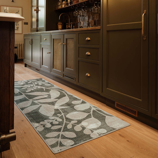 Eden Leaves Green Eco-Washable Runner- 100% recycled content runner featuring a white floral pattern against a green background.