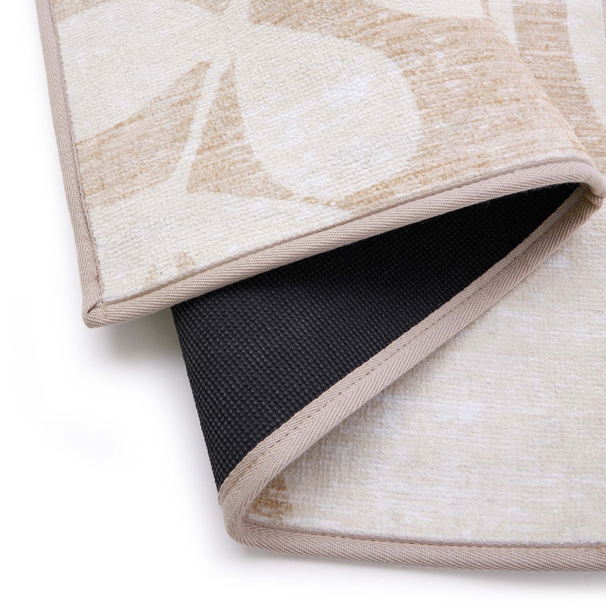 Eden Leaves Natural Eco-Washable Rug- 100% recycled polyester rug featuring a white floral pattern.