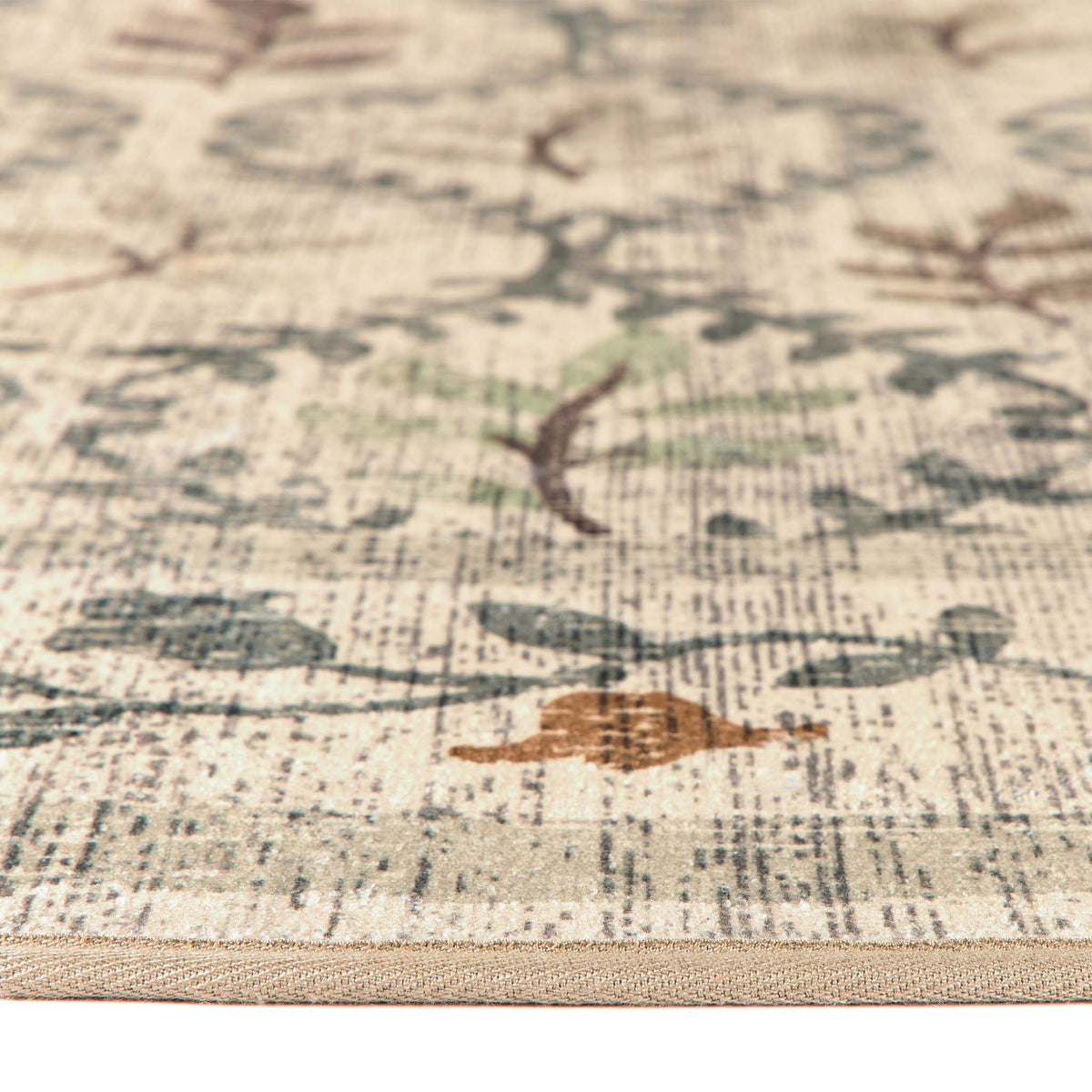 Close-up of English Garden Eco-Washable Circle Rug with a nature design.