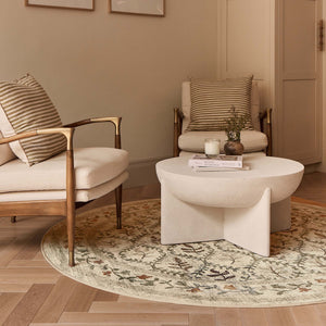 English Garden Eco-Washable Circle Rug with a nature design, styled on wooden flooring.