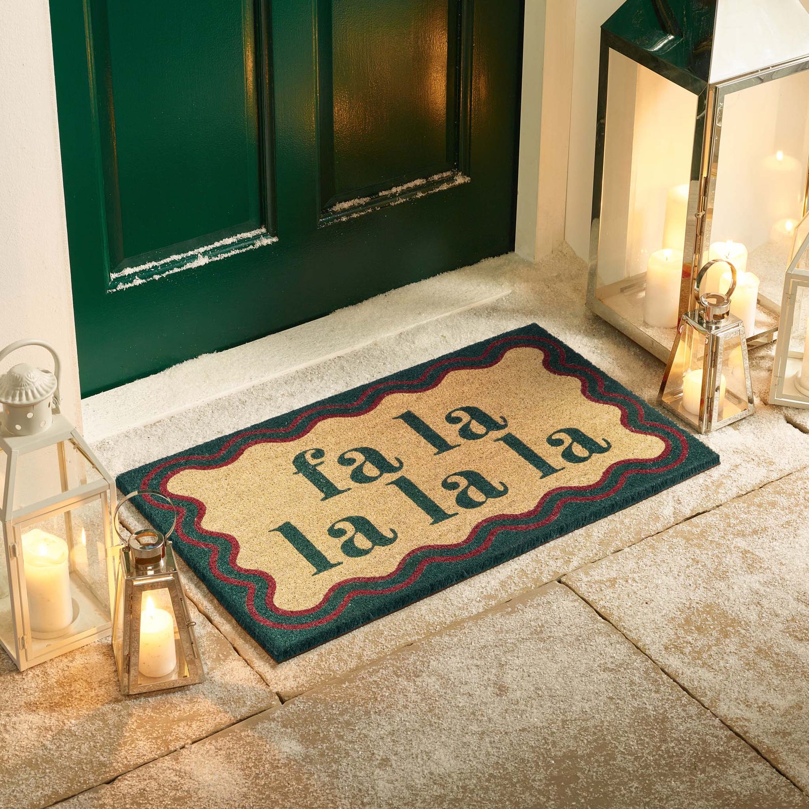 Christmas Fa La La La La Coir Doormat-. Made from eco-friendly materials featuirng a graphic design.
