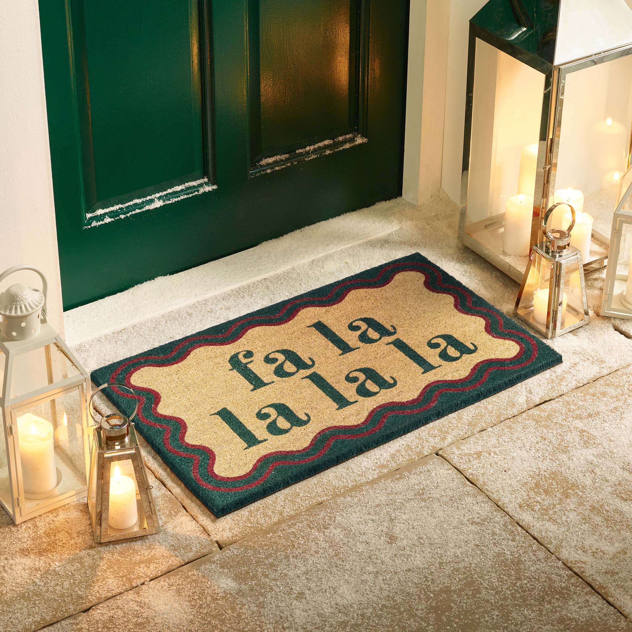 Christmas Fa La La La La Coir Doormat-. Made from eco-friendly materials featuirng a graphic design.