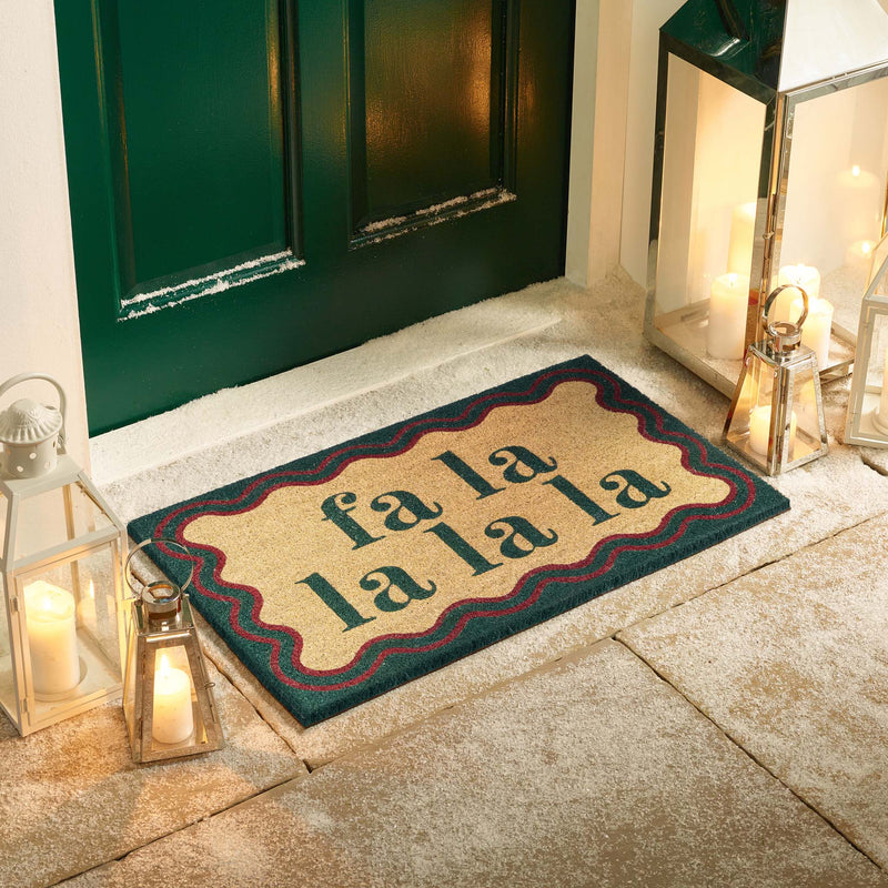 Christmas Fa La La La La Coir Doormat-. Made from eco-friendly materials featuirng a graphic design.