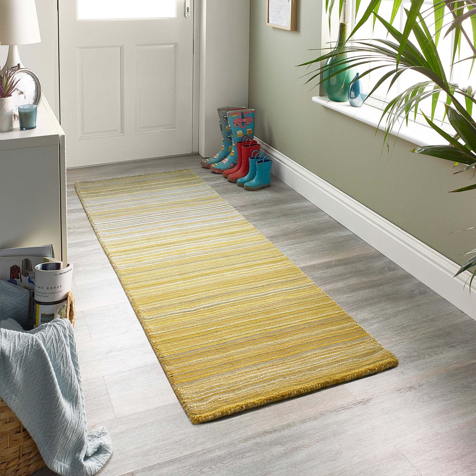 Fine Stripes Ochre Runner - a 100% yellow wool runner featuring a striped pattern. 