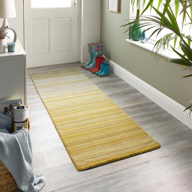 Fine Stripes Ochre Runner - a 100% yellow wool runner featuring a striped pattern. 