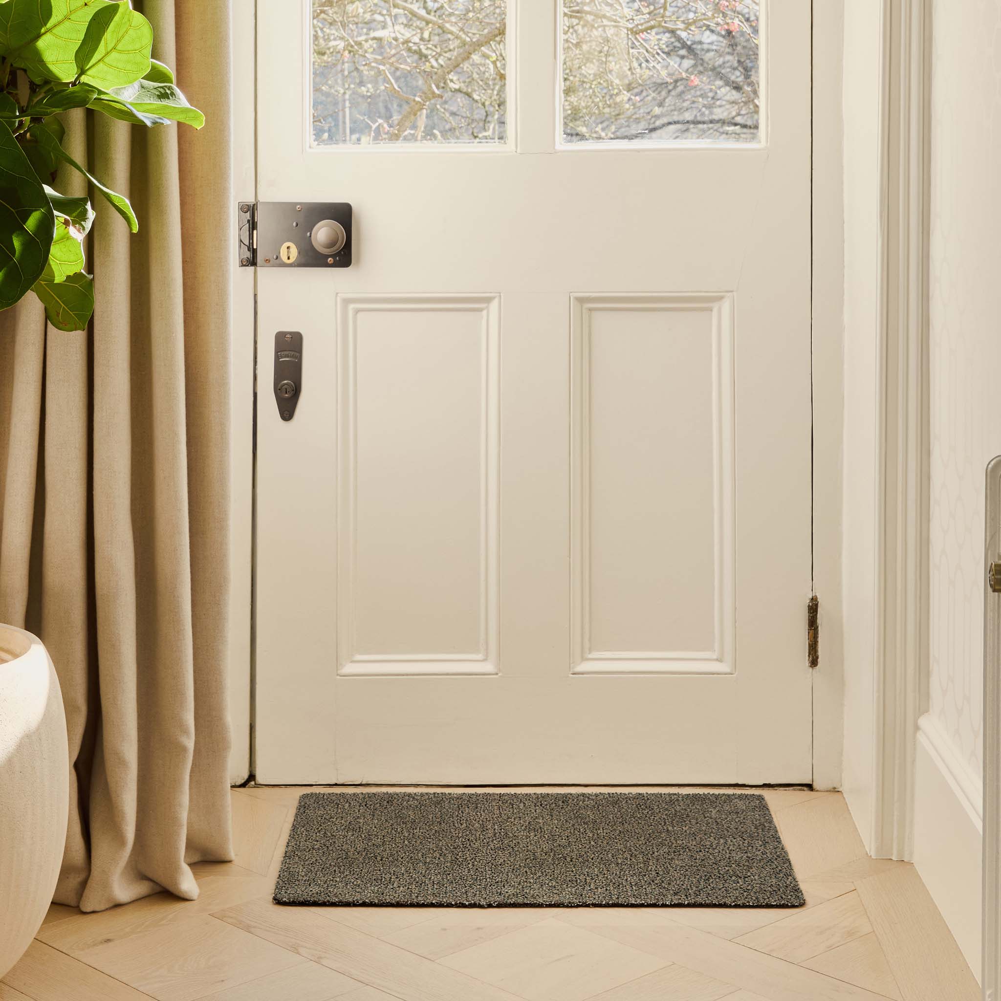 Plain Fleck Coffee Doormat - a 100% recycled material doormat in brown fleck pattern.