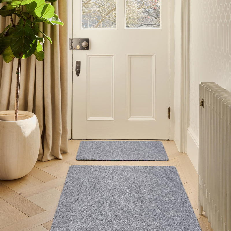Plain Fleck Soft Silver Doormat made from recycled cotton, featuring a solid grey and silver design. 
