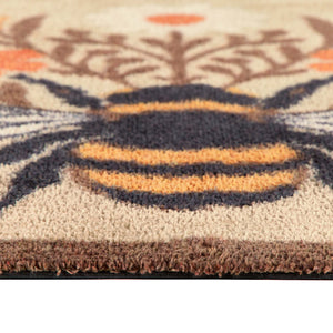 Close-up of Floral Bee Beige Charity Doormat with a floral bee design.