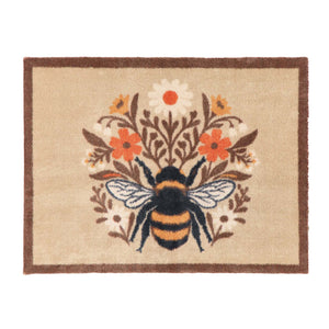 Floral Bee Beige Charity Doormat with a floral bee design.