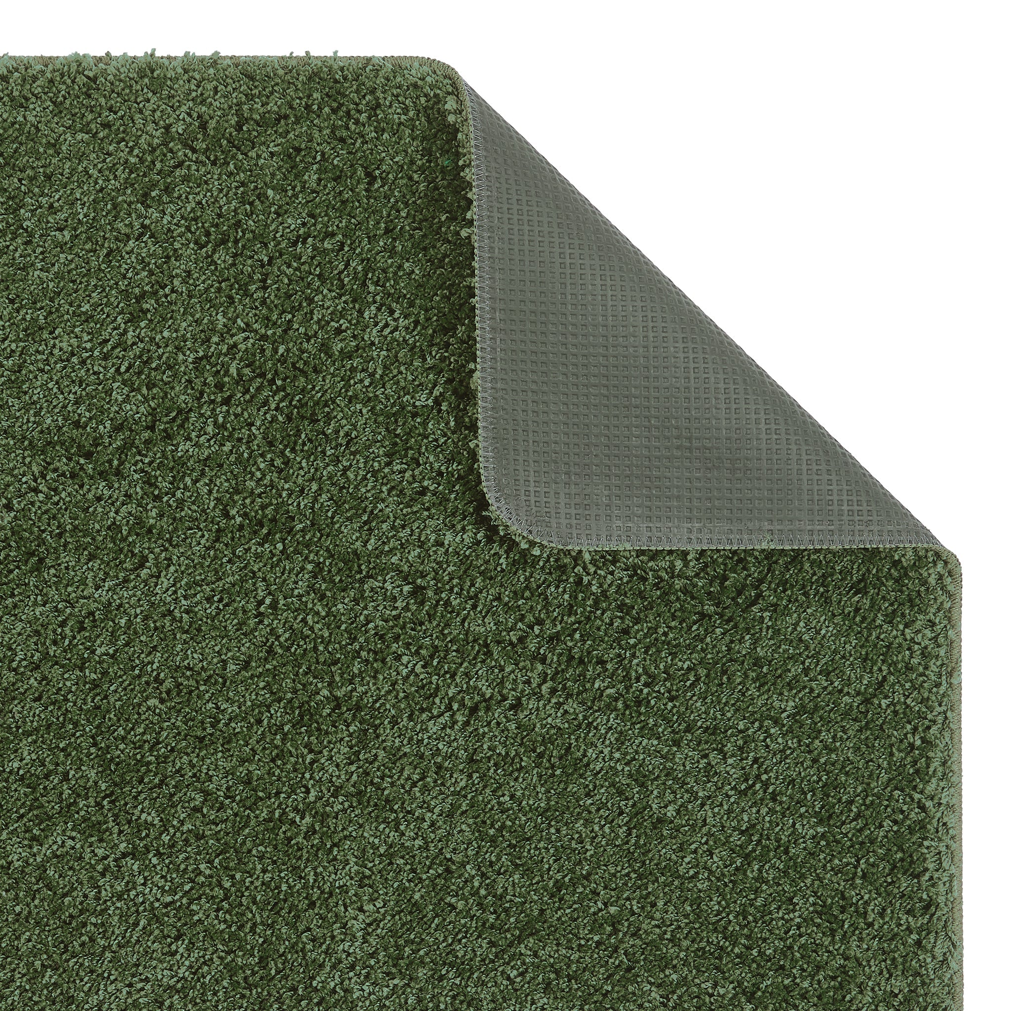 Forest Green Washable Rug in a solid green colour, fully machine washable.