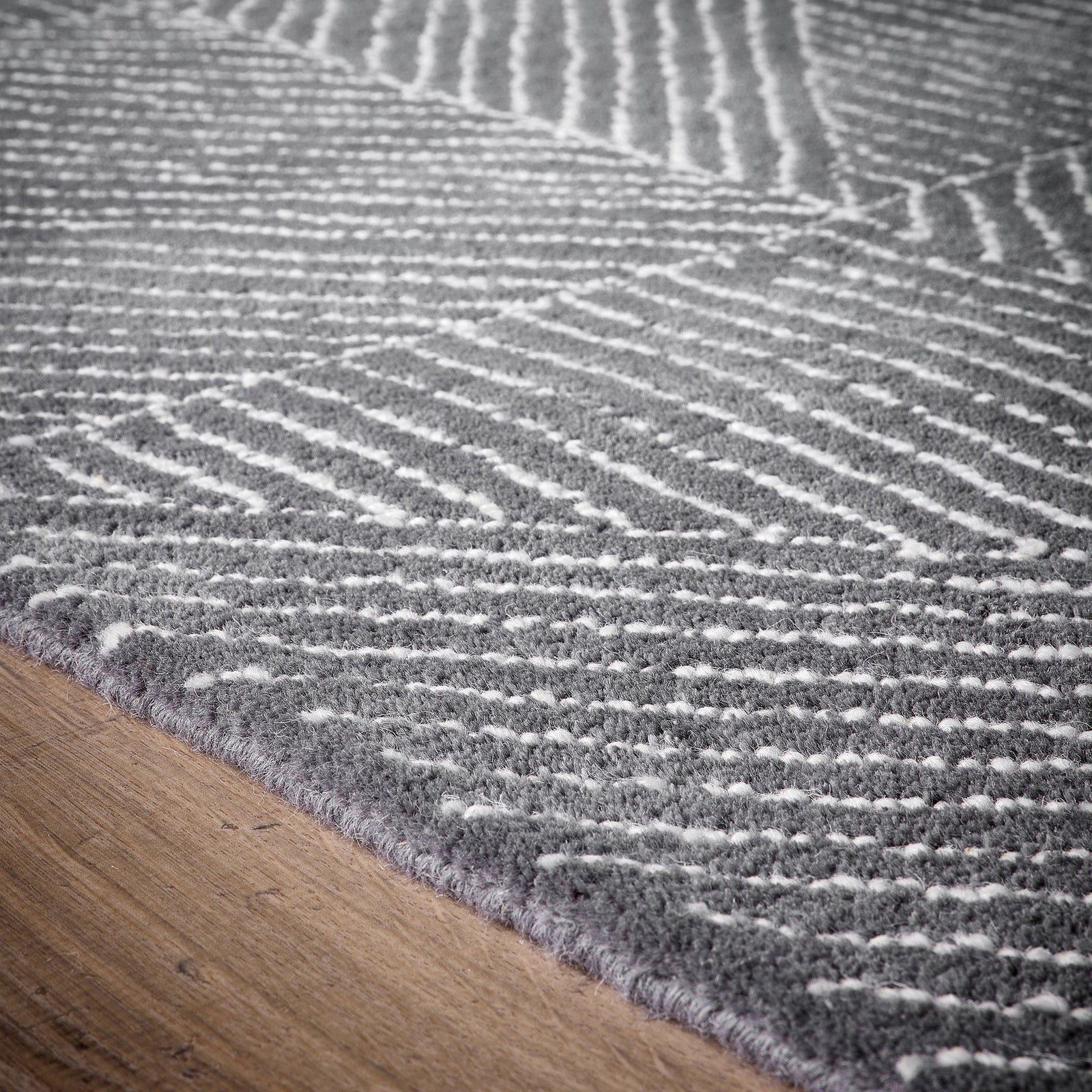 Geometric Rug- 100% wool cut pile rug with a geometric pattern. 