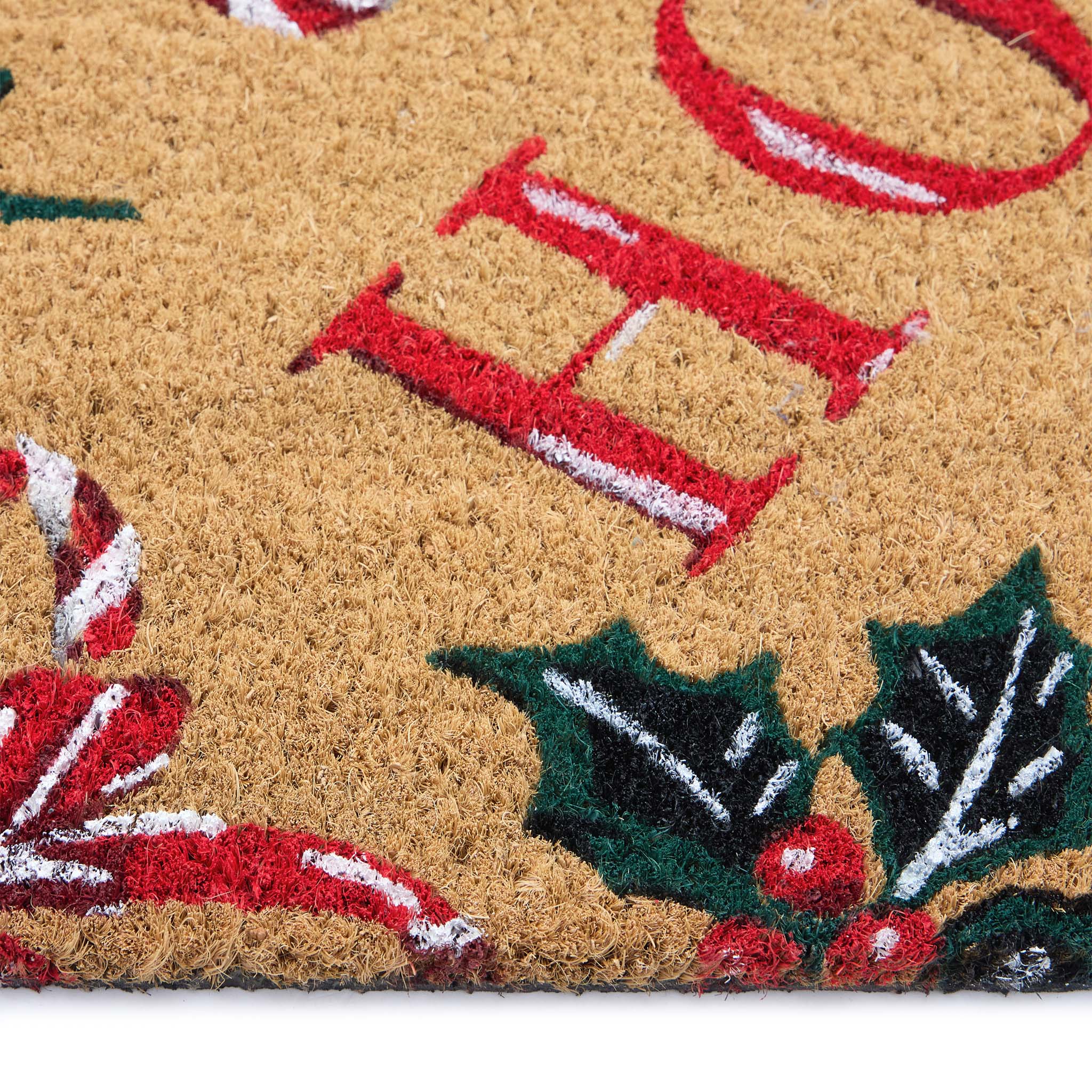 Close-up of HO HO HO Coir Doormat with a fun Christmas design.