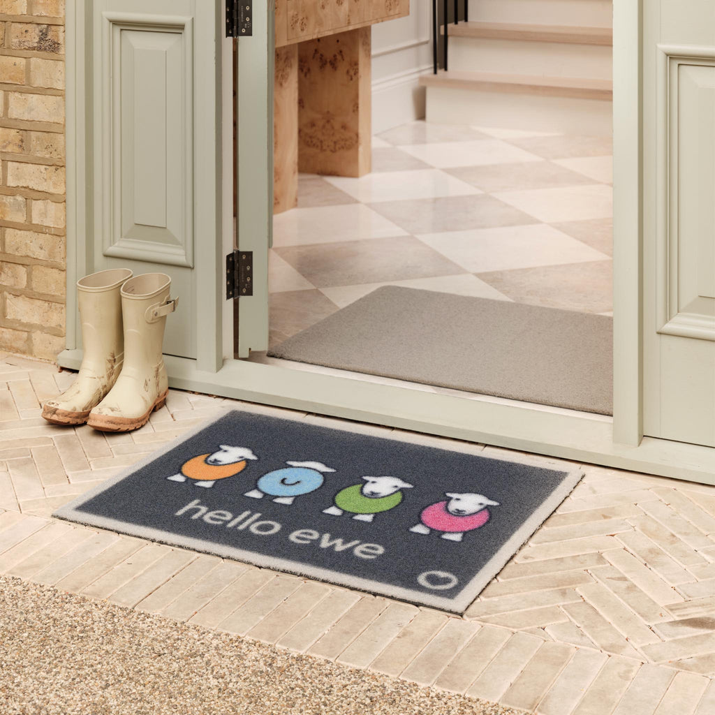 Hello Ewe Outdoor Doormat- 100% recycled nylon blue outdoor doormat featuring four colourful Highland cows.
