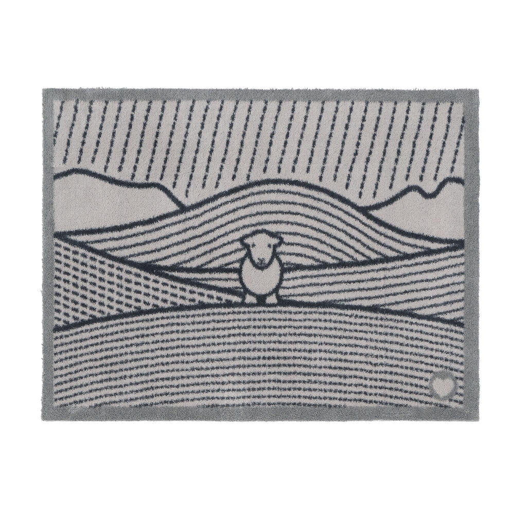 Herdy Lines Doormat- A cotton doormat featuring a Herdy in a field.