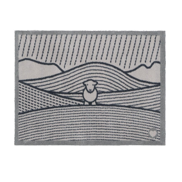 Herdy Lines Doormat- A cotton doormat featuring a Herdy in a field.