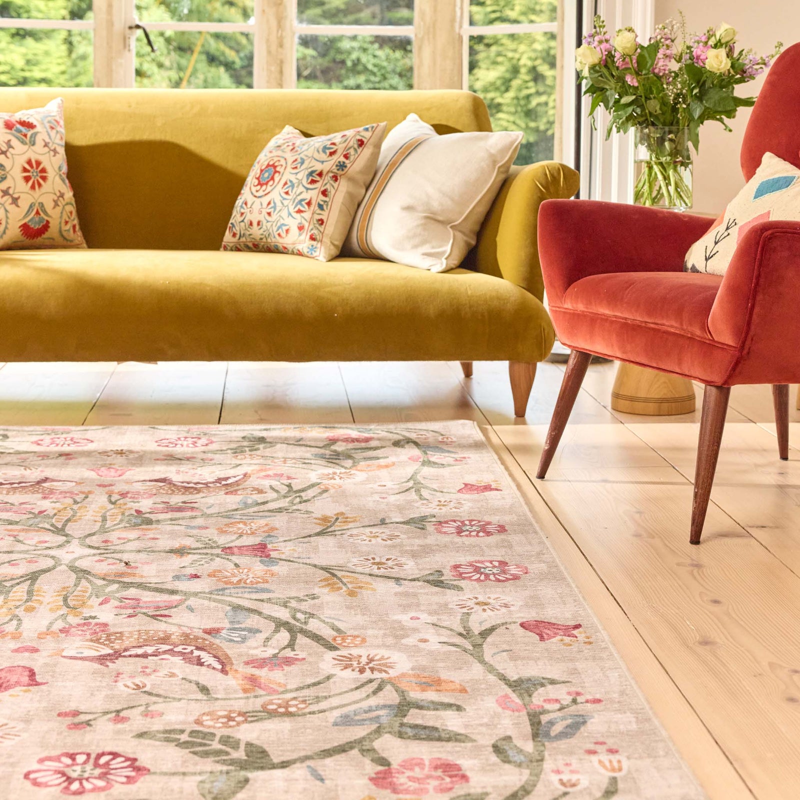 Heritage Garden Eco-Washable Rug with a nature-inspired floral design, styled in a living room.