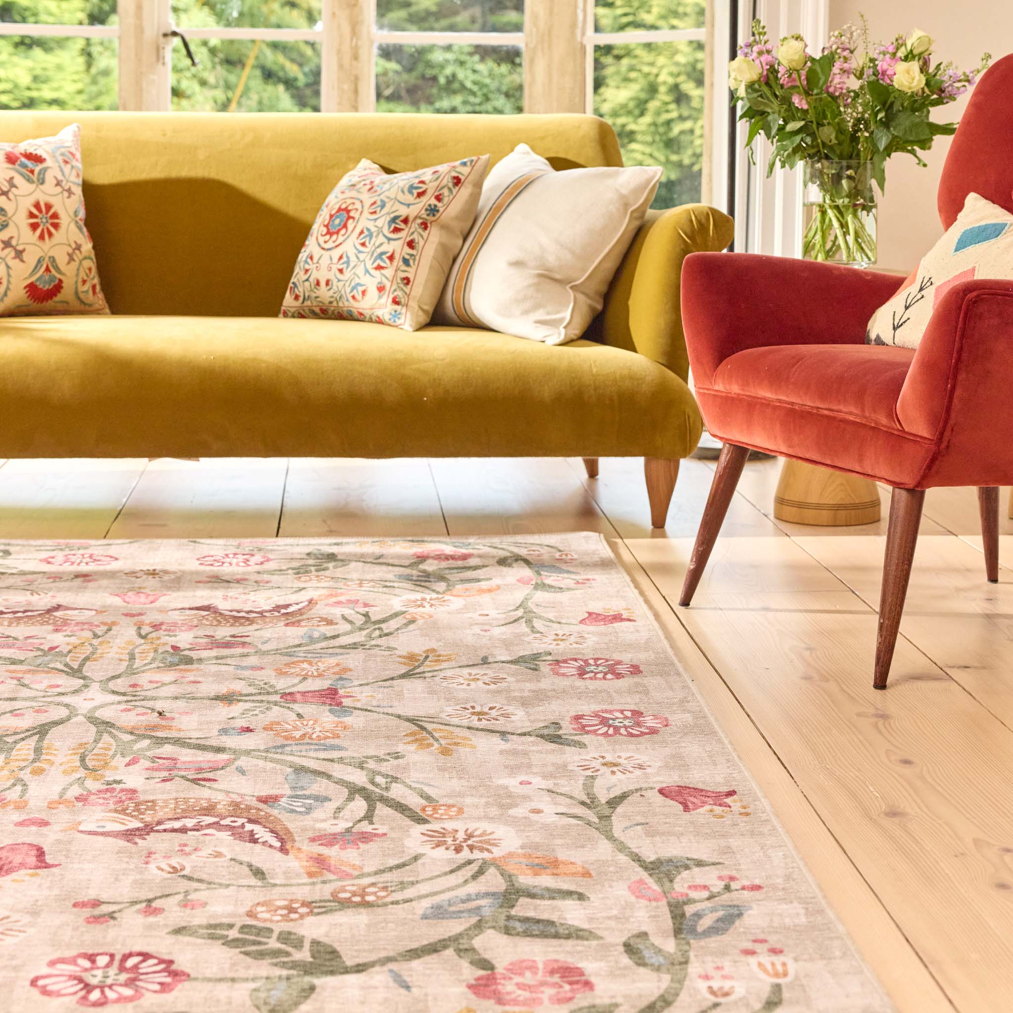 Heritage Garden Eco-Washable Rug with a nature-inspired floral design, styled in a living room.