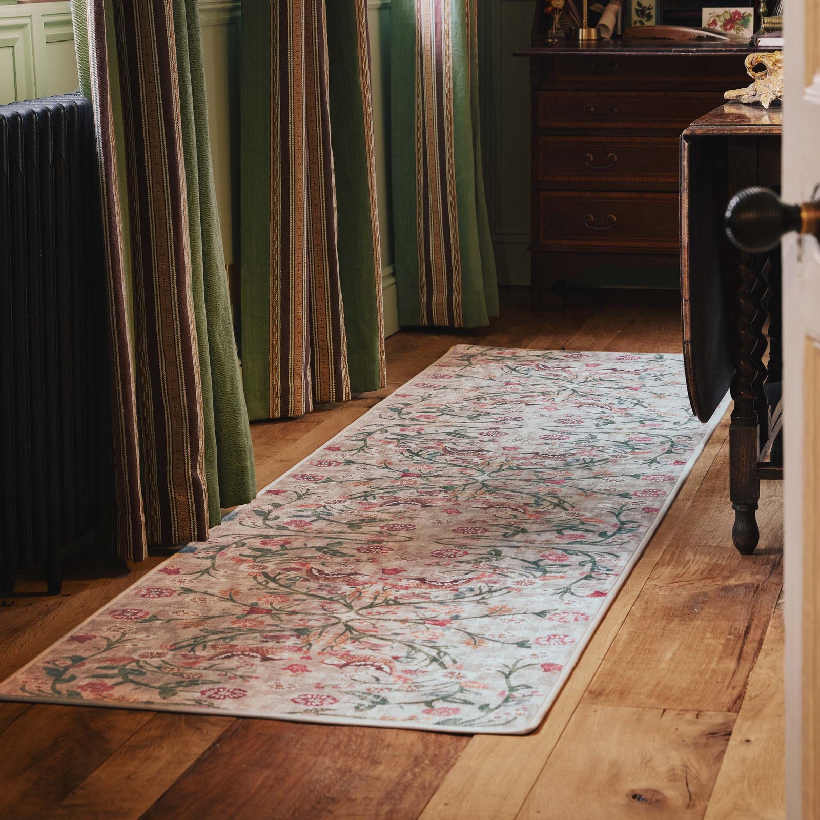 Heritage Garden Eco-Washable Runner with a nature-inspired floral design, styled on wooden flooring.