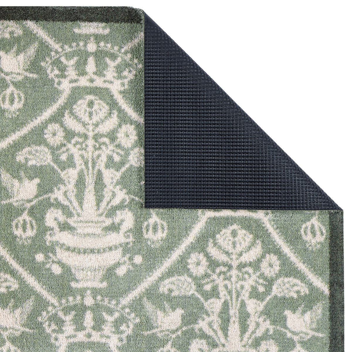 Highgrove Damask Silver Green Washable Doormat with a traditional style pattern showing the rubber backing.
