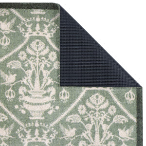 Close-up of the Highgrove Damask Silver Green Washable Runner with a traditional style pattern showing the rubber backing.