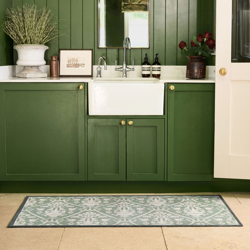 Highgrove Damask Silver Green Washable Runner with a traditional style pattern, styled by the sink.