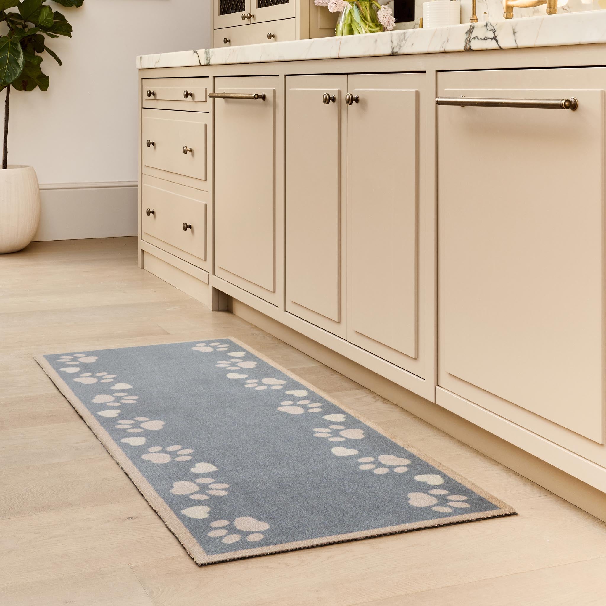 Home Paws Blue Runner- a cotton runner with a light blue background with white paw prints and love hearts. 