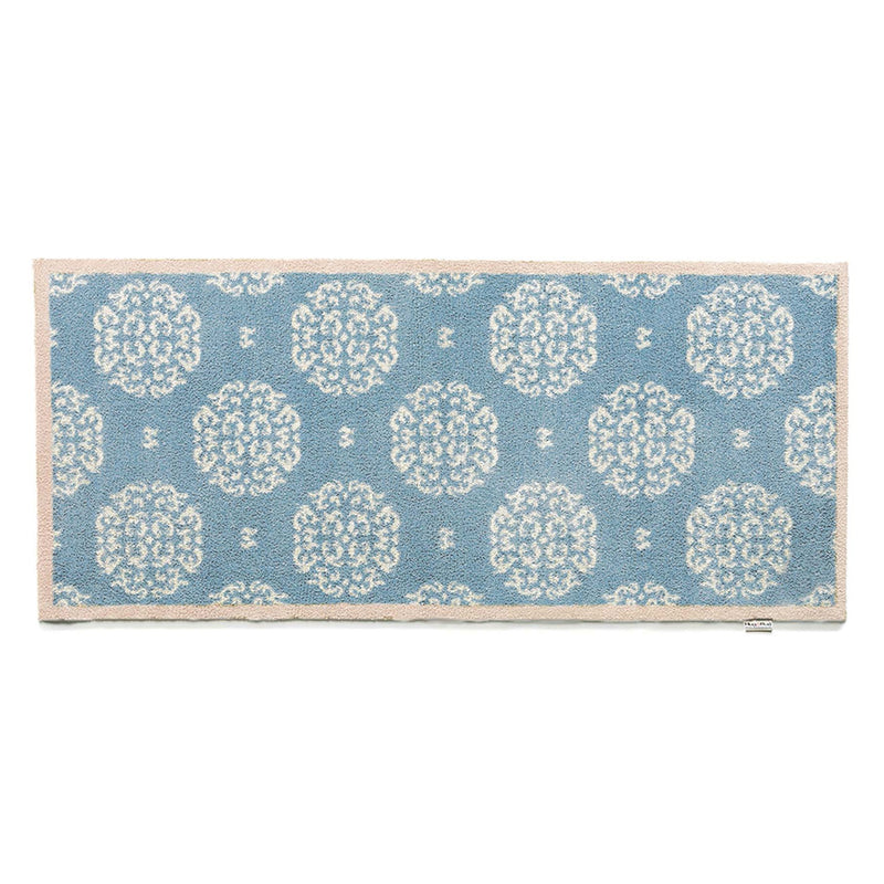 Home 15 Blue Washable Runner in Blue - a 100% recycled cotton runner featuring a delicate white floral pattern.