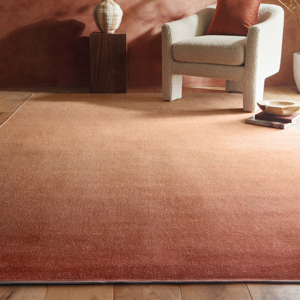 Horizon Ombre CoralEco-Washable Rug- a 100% recycled material rug featuring a orange\red ombre design.