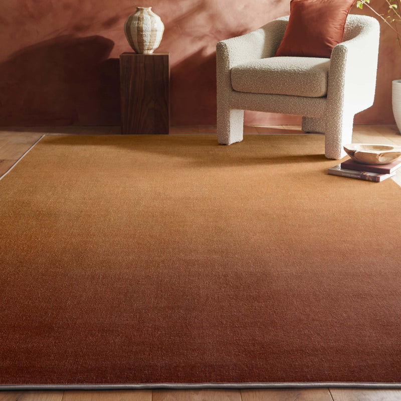 Horizon Coral Ombre Eco-Washable Rug - a 100% recycled material rug featuring a red and orange ombre effect.
