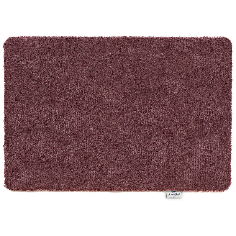 Sense Rose Pink Washable Doormat in a dark solid pink colour.