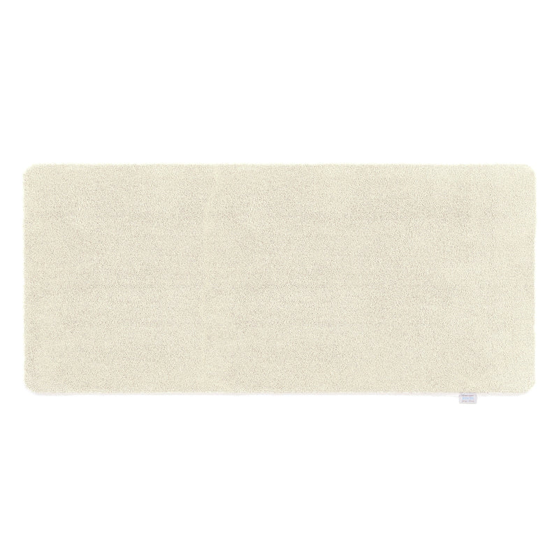 Pumice Stone Washable Runner- a 100% recycled PET plastic runner in a solid cream colour.