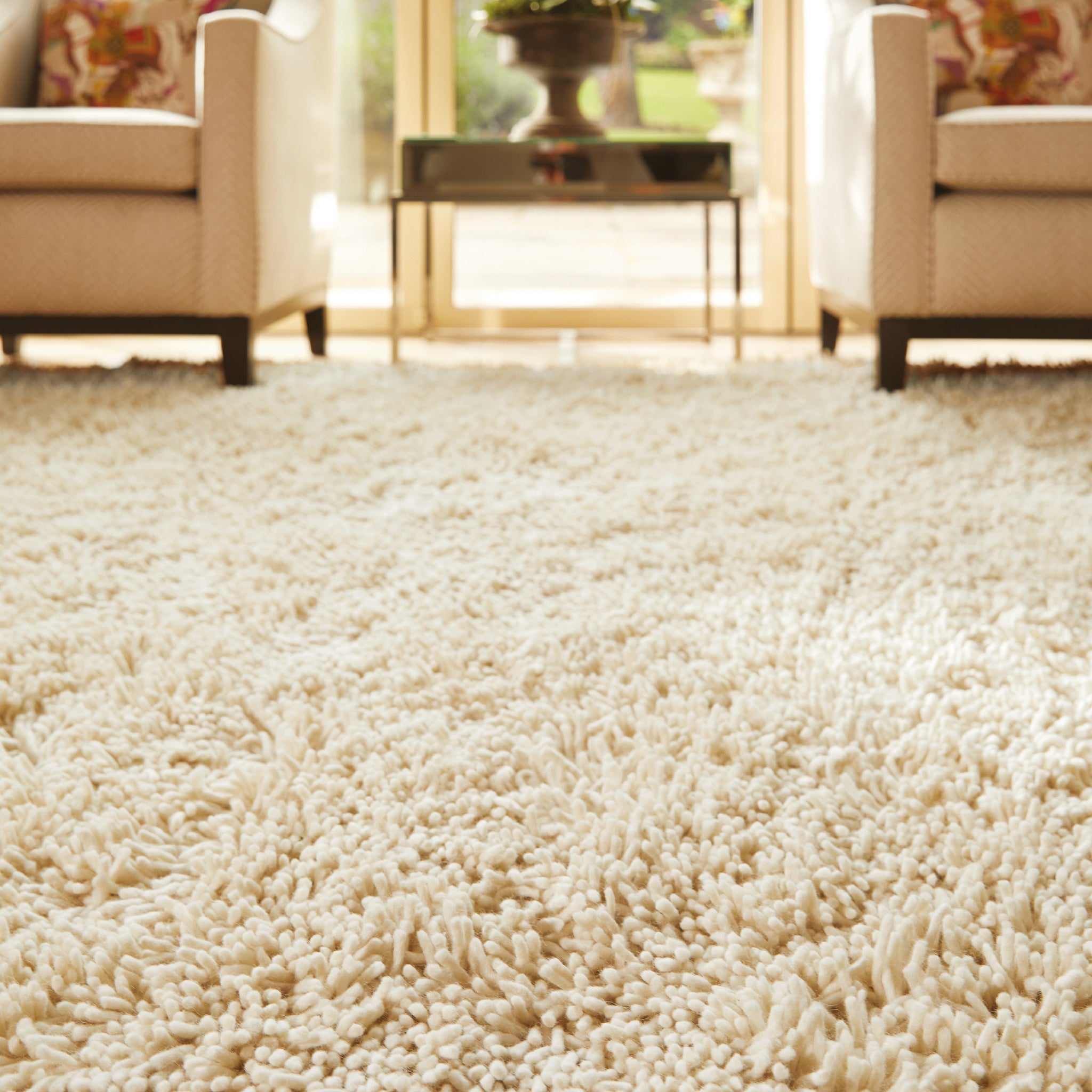 Imperial Ivory Rug made from 100% wool, featuring a saggy blend of light cream.