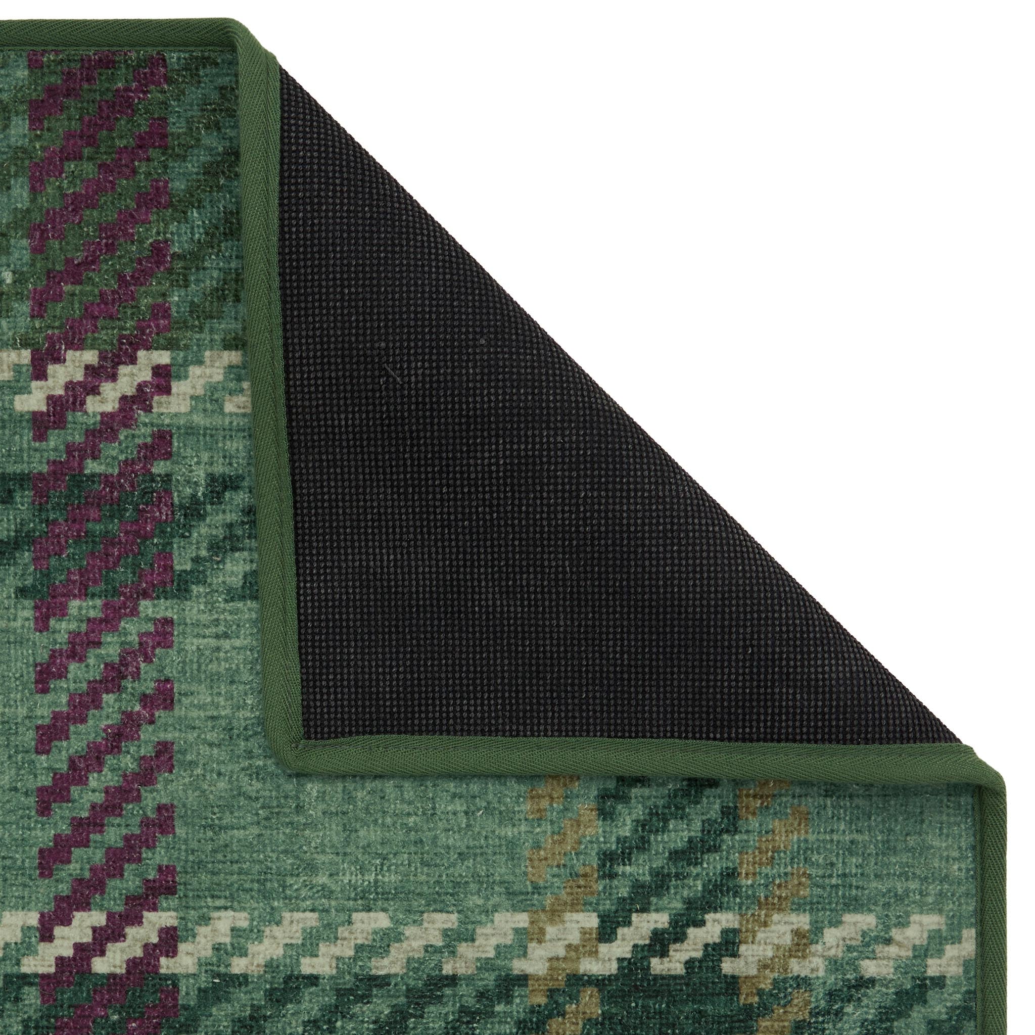 Isla Plaid Emerald Green Eco-Washable rug- a tartan rug in various shades of green.