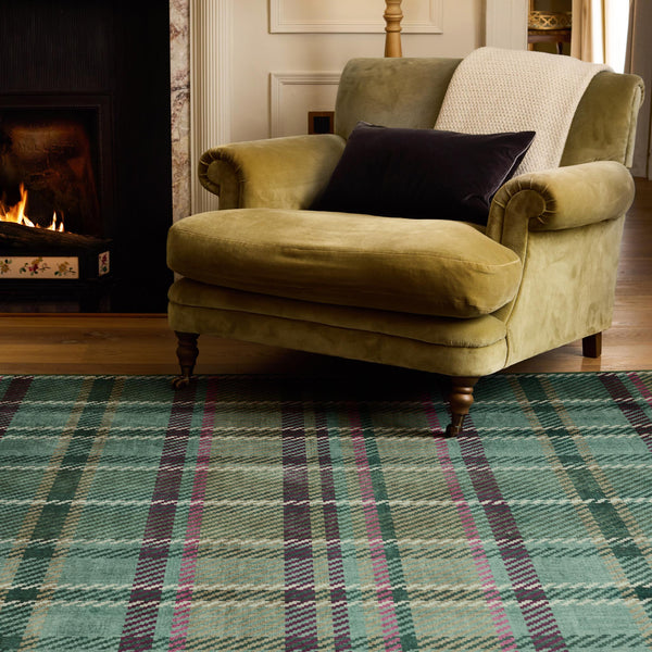 Isla Plaid Emerald Green Eco-Washable rug- a tartan rug in various shades of green.